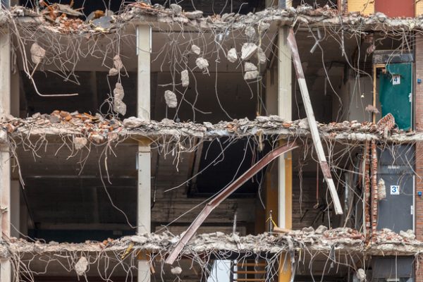 Pieces of Metal and Stone are Crumbling from Demolished Building Floors